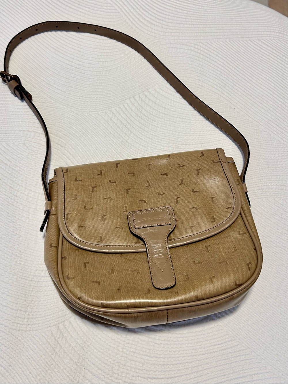 Elegant Tan Shoulder Bag with Subtle Monogram Detail
